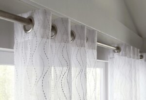 A-close-up-of-grommet-styled-sheer-drapes